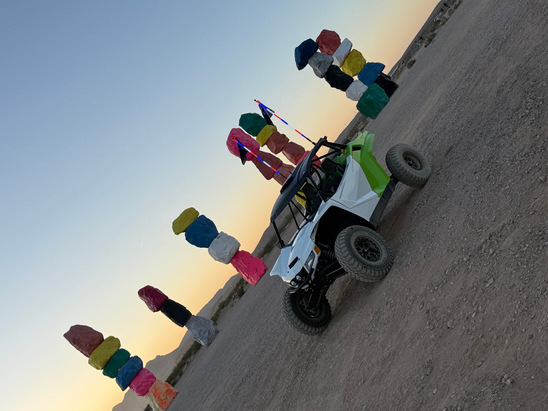 UTV with the 7 Magic Mountains in background